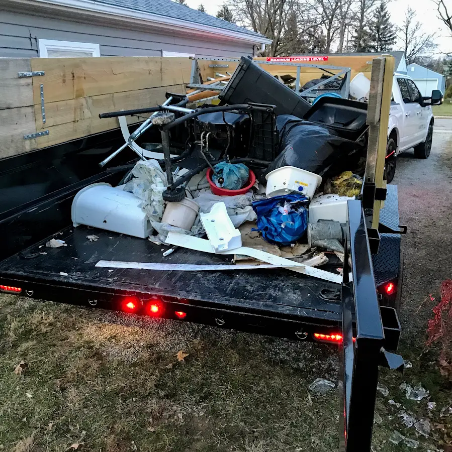Roll-off dumpster delivered to a residential driveway in Long Lake