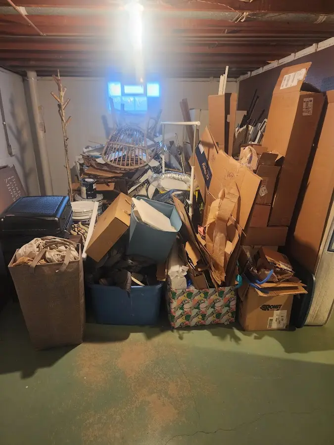 Roll-off dumpster container at job site for 20 Yard Dumpster Rental in Long Lake